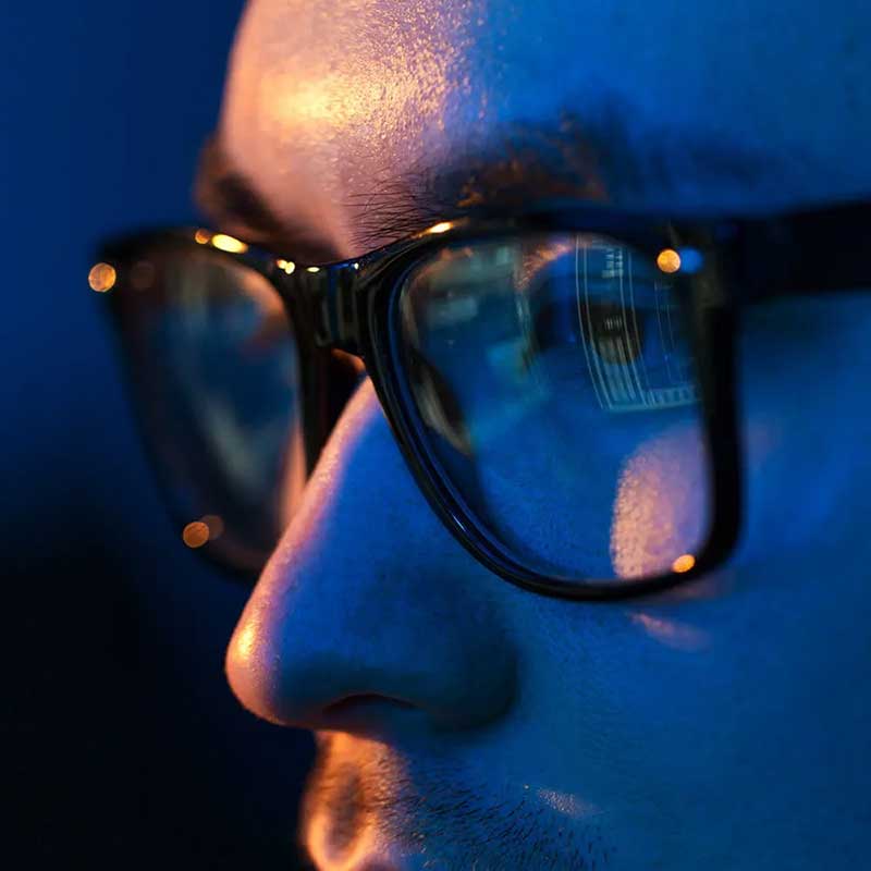 close up of a man with glasses